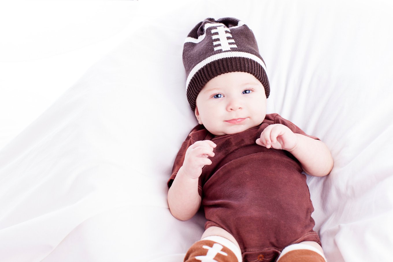 Baby wearing a football costume