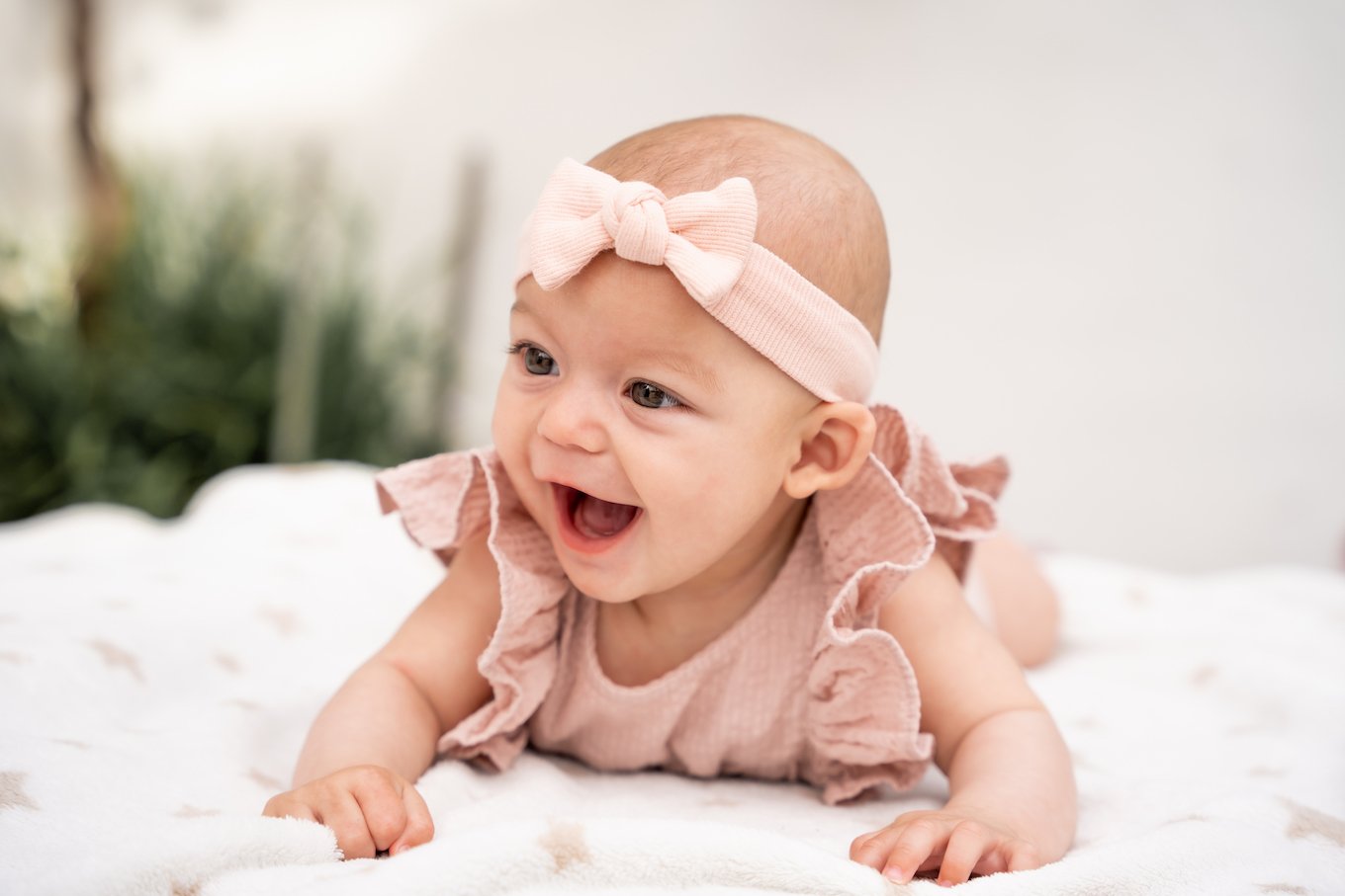 Baby girl in a pink headband