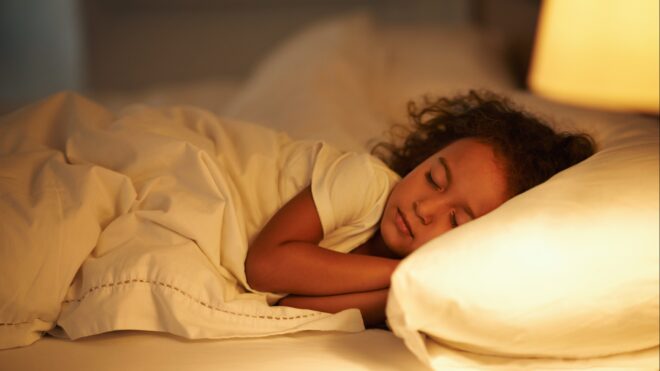 Girl sleeping in the bed